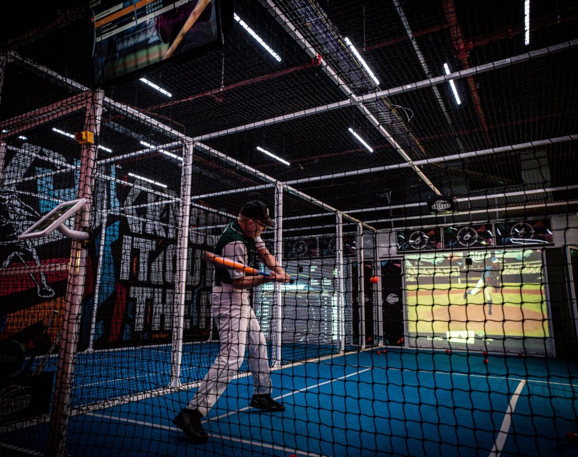 A batter on a Baseball Simulator